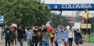 migrantes venezolanos regresando desde Colombia-ndv