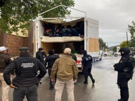 migrantes escondidos en camiones